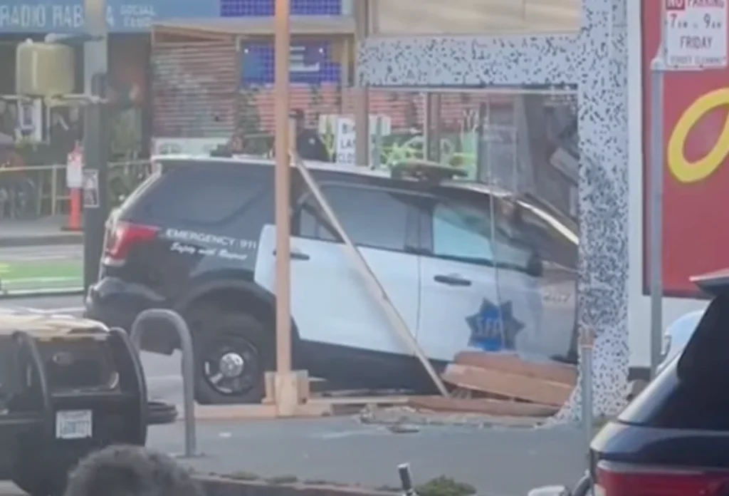 Police Vehicle Crashes into Building